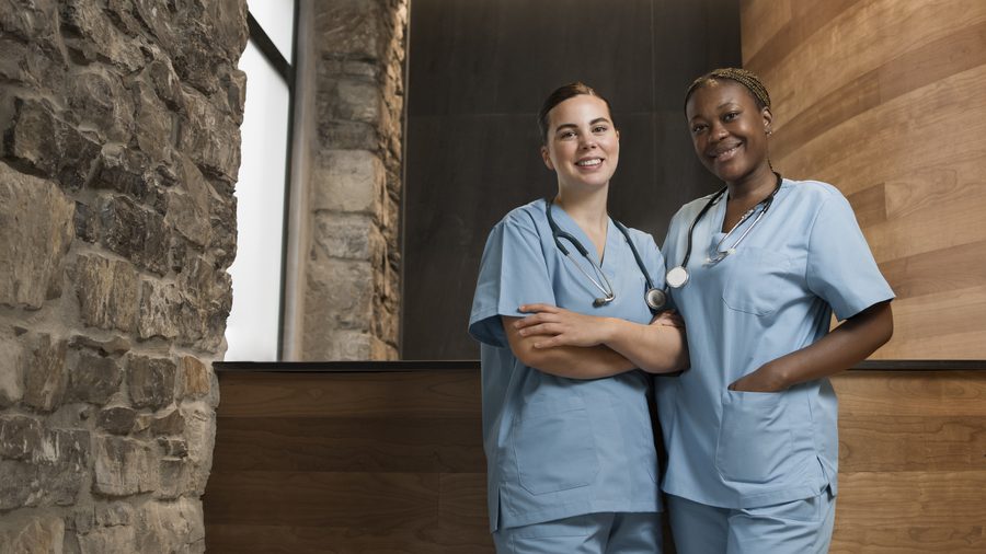Healthcare professional supporting a patient
